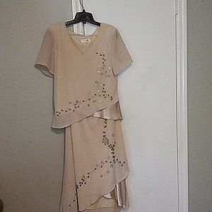 Women's studio size 12 cream colored dress.